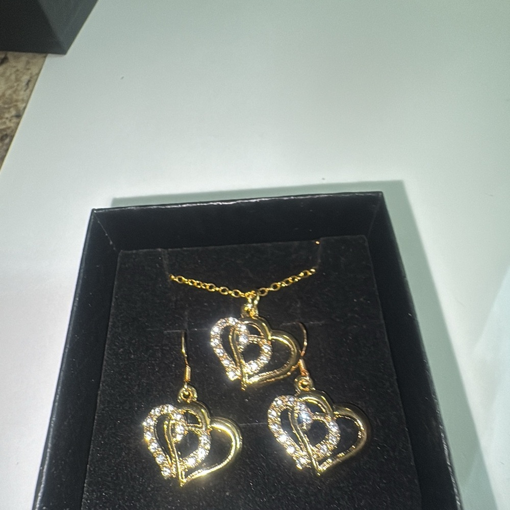 Elegant Gold and Silver Heart Earrings with Crystals